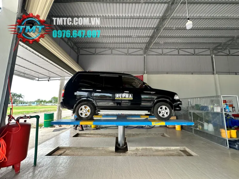 Báo Giá Cầu Nâng 1 Trụ Rửa Xe Ô Tô Mới Nhất 2026 (Trọn Gói Lắp Đặt) 3 Cầu nâng 1 trụ lắp âm nền chữ H - TMTC